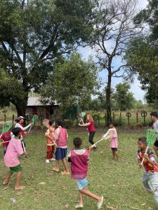 Kids playing Lacrosse in Cambodia